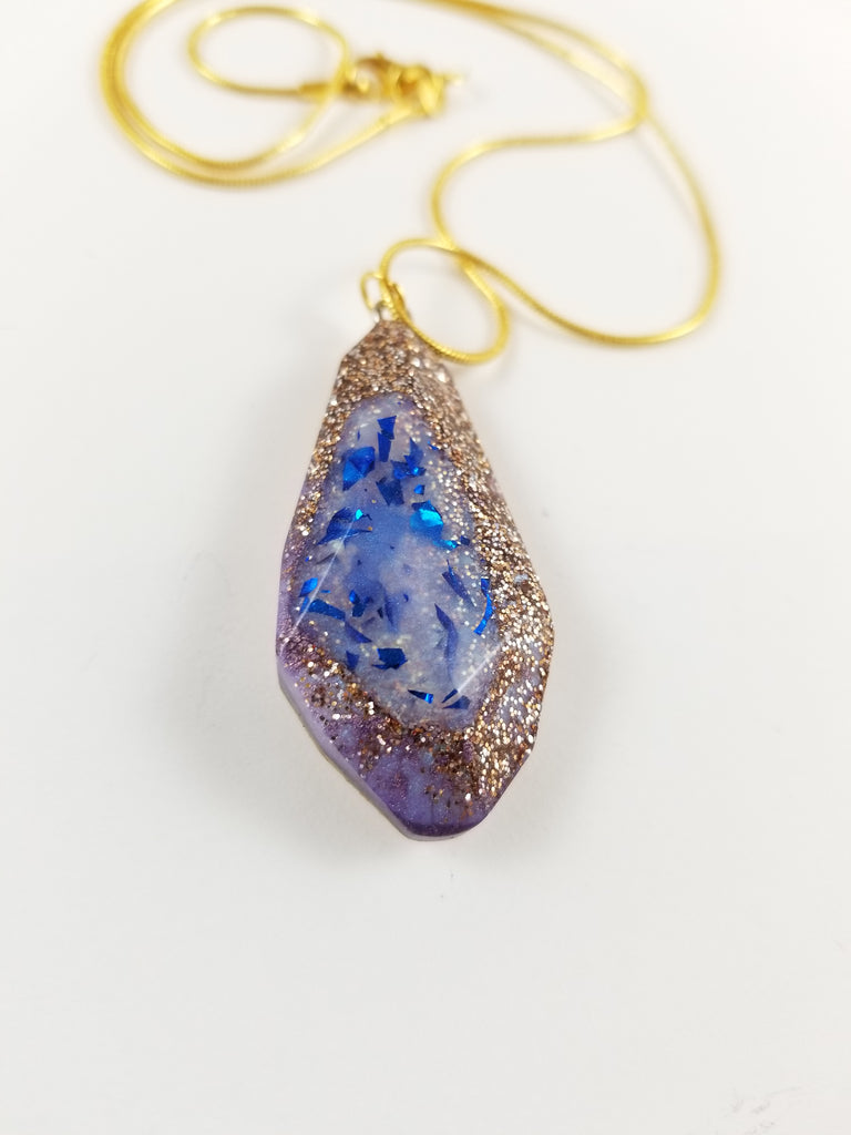 Gold and blue pendant