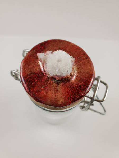 Geode in red clasp jar