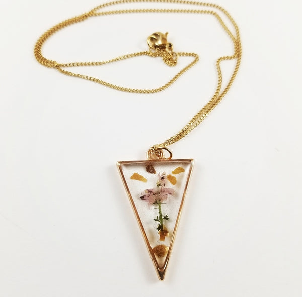 Pink triangle with gold flakes